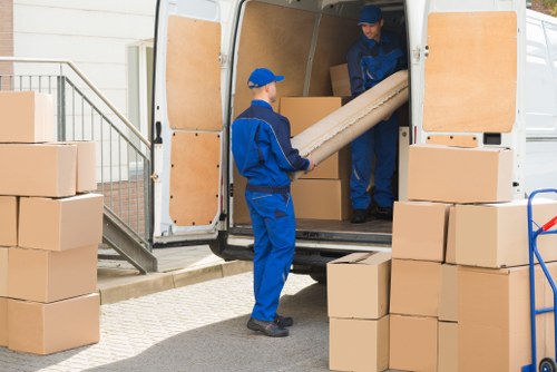 Person using an accessible Removal Van Richmond website on a laptop