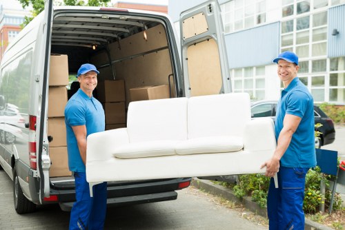 Removal van team loading furniture safely in Richmond