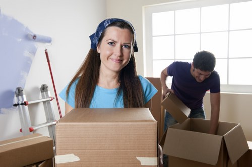 Removal van loaded with household boxes during a moving service