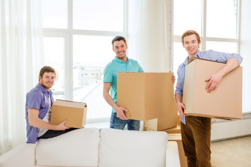 Professional movers loading boxes into a van in Richmond