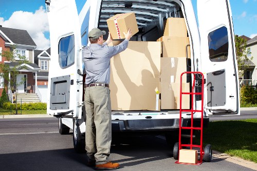 Packed office equipment and furniture ready for transport