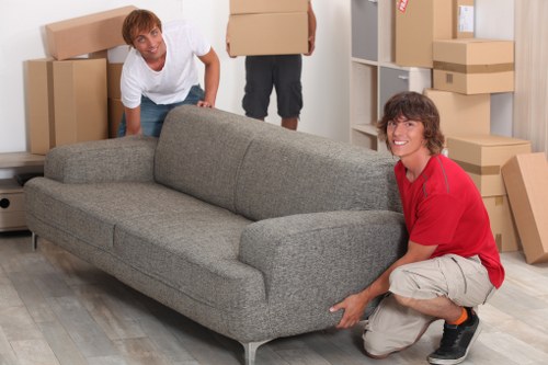 Professional team handling bulky furniture pick-up in Richmond