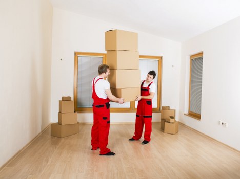 Moving bulky furniture through a Richmond property doorway